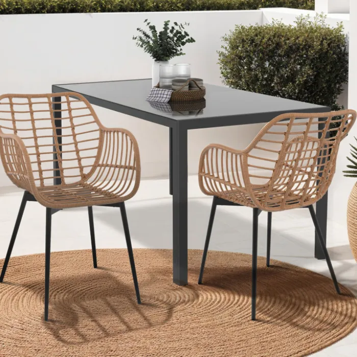 2 fauteuils de table effet rotin et pied métal noir