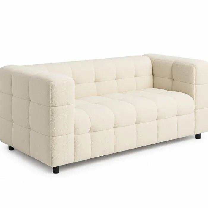 Canapé double capitonné en tissu bouclette beige