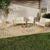 Salon de jardin bas 6 places structure métal blanc et cordage effet rotin avec coussins beige