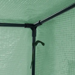 Serre de jardin verte avec porte et fenêtres relevables