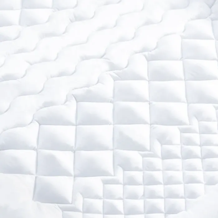 Surmatelas 140x190 cm 7 zones de confort moelleux