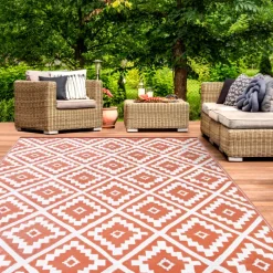 Tapis extérieur terracotta et blanc motifs géométriques 180 x 280 cm