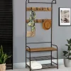 Vestiaire d’entrée style industriel avec banquette